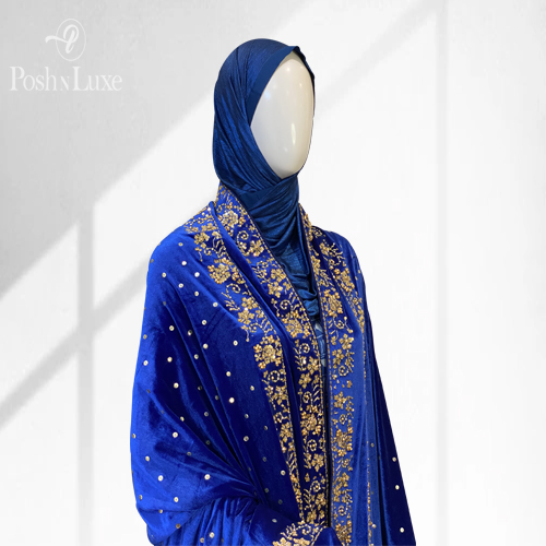 blue velvet shawl woman wearing a blue hand embroidered shawl. The shawl features double embroidered border on all four edges of the velvet shawl.